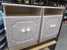 2 white bedside cabinets