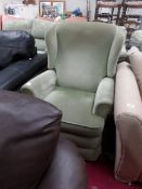 A wing backed arm chair