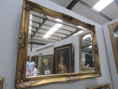 A gilt framed bevel edged mirror