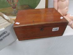 A sewing box and contents