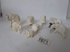 8 carved elephants (bone etc)