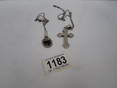 A silver cross on chain and a silver pendant on chain set Blue John