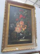 A gilt framed oil on canvas floral study