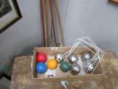A croquet set and a set of French boulle's (no boxes)
