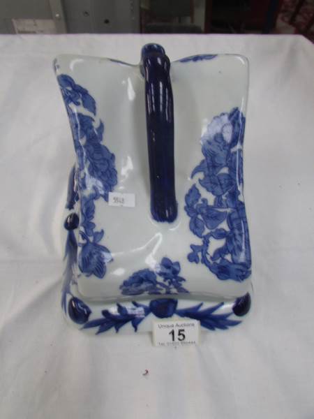 A large blue and white cheese dish