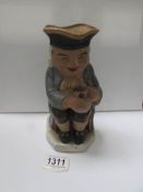 An unusual old rubber Toby jug,