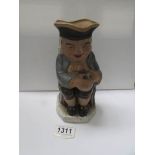 An unusual old rubber Toby jug,