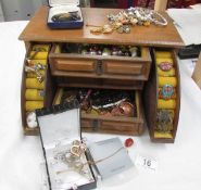 A jewellery box with large quantity of costume jewellery