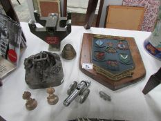 A mixed lot of military themed items including lighter, Junior N.B.