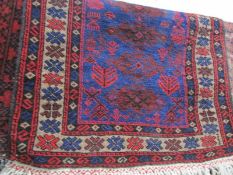 A red patterned rug