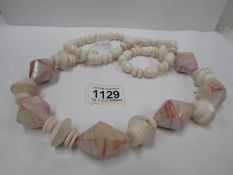 A long necklace of agate stones