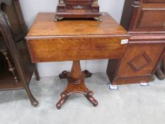 A Victorian mahogany drop side 2 drawer tea table