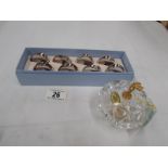 A set of 8 silver plated napkin rings and a Killarney crystal lidded bowl with 24ct gold detail