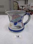 A hand painted pottery jug marked Collard