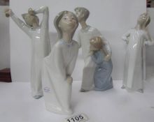 4 Lladro figurines of children in nightgowns