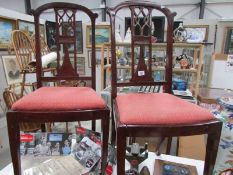 A pair of bedroom chairs