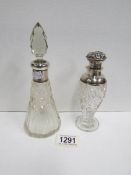 Two Victorian silver topped perfume bottles in cut crystal
