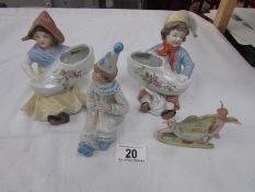 A pair of Dutch children figures,