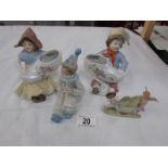 A pair of Dutch children figures,