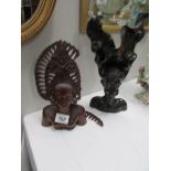 2 carved African heads,