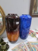 A large blue West German pottery vase and a large brown example