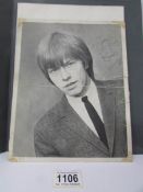 A signed photograph of Rolling Stones founder Brian Jones