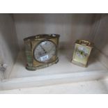 A carriage clock and one other