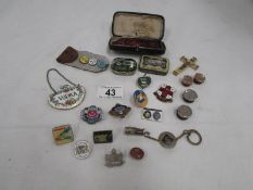 A mixed lot including badges,