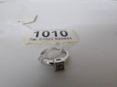 An 18ct white gold 20pt diamond ring,