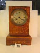 An Early French inlaid mantel clock marked Laine, Paris.