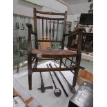 A 19th century carver chair with string seat