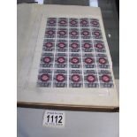 An album of GB stamps including mint full sheets