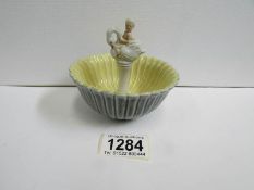 A Wade pottery bowl with boy sitting on swan