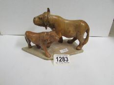An antique oriental stone carving of water buffalo