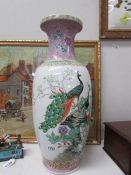 A large hand painted 20th century famille rose vase,