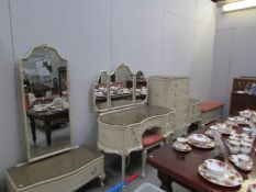 A French style bedroom suite comprising dressing table, stool, 2 chests of drawers,