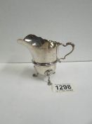 An Edwardian silver cream jug,