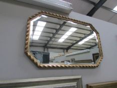 A gilt framed bevel edged mirror