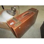 An old leather suitcase,