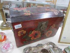A lacquered chest with Chinese/Japanese writing