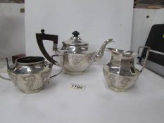 A 3 piece Chinese silver tea set with inscription from Lincolnshire regiment