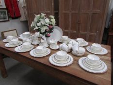 In excess of 100 pieces of Royal Doulton Gold Concord tea and dinner ware