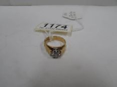 A 22ct gold ring set clear stone, 6.