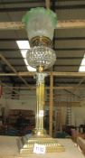 A Corinthian column oil lamp with brass base,