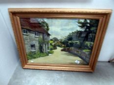 A framed and glazed cottage watercolour signed W V cook