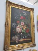 A large gilt framed floral oil on canvas