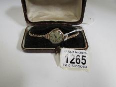 A ladies Rotary 9ct gold wrist watch and strap,