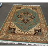 A blue ground Kesham rug,