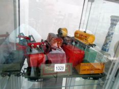 A quantity of Hornby 0 gauge rolling stock and buffers,