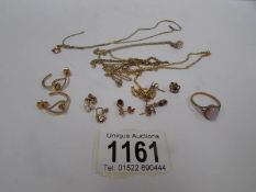 A mixed lot of 9ct gold jewellery including chains, earrings, (14gms)